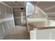 Hallway under construction with a staircase and view of the house at 766 Old Station Pointe, Angier, NC 27501