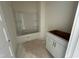 Bathroom features a bathtub and a vanity ready for finishing touches, perfect for relaxation at 771 Old Station Pointe, Angier, NC 27501