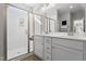Modern bathroom featuring a glass enclosed shower, double sink vanity, and sleek fixtures at 771 Old Station Pointe, Angier, NC 27501