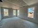Bright unfinished bedroom with three large windows and natural light at 771 Old Station Pointe, Angier, NC 27501