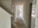 Bright hallway leading to the front door showcases the home's open layout at 771 Old Station Pointe, Angier, NC 27501