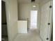 Bright hallway showing access to other rooms, with neutral paint and classic white doors and trim at 771 Old Station Pointe, Angier, NC 27501