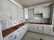 Modern kitchen with white cabinets awaiting countertops and appliances at 771 Old Station Pointe, Angier, NC 27501
