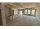 Spacious room with lots of natural light featuring a sliding door and large windows at 771 Old Station Pointe, Angier, NC 27501