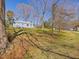 Home on a spacious lot with mature trees and a gentle slope at 774 Cornelius St, Hillsborough, NC 27278
