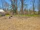 Large backyard is already partially fenced with room for entertaining and gardening at 774 Cornelius St, Hillsborough, NC 27278