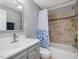 Bathroom with tub and shower with tile surround at 774 Cornelius St, Hillsborough, NC 27278