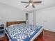 Bedroom with hardwood floors, ceiling fan, two closets and furniture at 774 Cornelius St, Hillsborough, NC 27278
