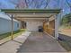 Carport with concrete floor and metal roof at 774 Cornelius St, Hillsborough, NC 27278