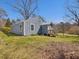 Exterior of home with a small porch and trees at 774 Cornelius St, Hillsborough, NC 27278