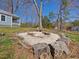 Custom built firepit with sand, surrounded by trees and nature at 774 Cornelius St, Hillsborough, NC 27278