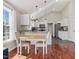 Eat-in kitchen area with natural light, a table with seating, and an open layout at 774 Cornelius St, Hillsborough, NC 27278