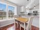 Eat-in kitchen nook boasts a bright window view and a table with seating for two at 774 Cornelius St, Hillsborough, NC 27278