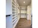 Spacious walk-in closet features custom shelving and storage solutions at 7808 Ailesbury Rd, Wake Forest, NC 27587
