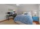 Comfortable bedroom featuring a well-lit desk area for work or study at 8000 N Bridgewater Ct, Raleigh, NC 27615
