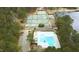 Wonderful aerial view of neighborhood tennis courts, pool, and clubhouse at 917 Queensferry Rd, Cary, NC 27511