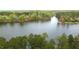 Breathtaking aerial view showcasing lakefront properties surrounded by lush greenery at 917 Queensferry Rd, Cary, NC 27511