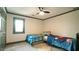 bedroom featuring two beds, a ceiling fan and a window that provides natural light at 917 Queensferry Rd, Cary, NC 27511