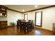 Cozy dining area with seating for six, hardwood floors, and lots of natural light at 917 Queensferry Rd, Cary, NC 27511