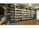 Dedicated library area with floor-to-ceiling bookshelves for a vast collection of books at 917 Queensferry Rd, Cary, NC 27511