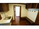Mud room with cubbies and bench. Laundry appliances and sink are adjacent at 917 Queensferry Rd, Cary, NC 27511