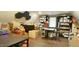 This office features a desk, chair, and a storage area with multiple storage boxes at 917 Queensferry Rd, Cary, NC 27511