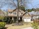 Charming two-story home with a two-car garage and a well-maintained front yard and landscaping at 921 Marshall Farm St, Wake Forest, NC 27587