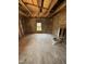 Bedroom under renovation with exposed studs and insulation at 1005 Chatham St, Sanford, NC 27330