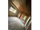 Bedroom under renovation with wood walls and ceiling at 1005 Chatham St, Sanford, NC 27330