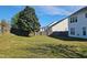 Large backyard with a tree and privacy fence at 1036 Steelhorse Dr, Fuquay Varina, NC 27526