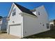 Side view of house showing two car garage at 1036 Steelhorse Dr, Fuquay Varina, NC 27526