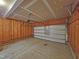 Spacious garage with an automatic door opener and concrete floor for easy maintenance and parking at 1036 Steelhorse Dr, Fuquay Varina, NC 27526
