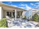 Inviting covered back patio with lounge chairs, offering a relaxing outdoor living space at 1038 Branwell Dr, Durham, NC 27703