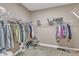 Walk-in closet with ample shelving and hanging space for organized storage at 1038 Branwell Dr, Durham, NC 27703