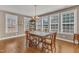 Spacious dining room featuring beautiful hardwood floors, natural light and traditional furnishings at 1038 Branwell Dr, Durham, NC 27703