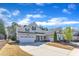 Attractive single-story home boasting a two-car garage and professionally maintained landscaping on a spacious lot at 1038 Branwell Dr, Durham, NC 27703
