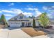 Charming single-story home with an attached two-car garage, a well-manicured lawn, and inviting curb appeal at 1038 Branwell Dr, Durham, NC 27703