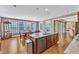 Spacious kitchen island with granite countertop and stainless steel dishwasher and trash compactor at 1038 Branwell Dr, Durham, NC 27703