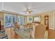 Bright living room boasts hardwood floors, ceiling fan, and sliding door access to the outdoor patio at 1038 Branwell Dr, Durham, NC 27703