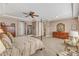 Spacious main bedroom featuring trey ceiling, sitting area, four-poster bed and great closet space at 1038 Branwell Dr, Durham, NC 27703