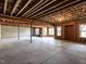 Spacious unfinished basement with concrete floors and exposed beams and ductwork, ready to be customized at 107 Bella Casa Way, Clayton, NC 27527