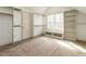 Unfurnished bedroom with lots of shelving, storage and natural light at 107 Bella Casa Way, Clayton, NC 27527