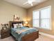 This cozy bedroom features a full bed, nightstands, and natural lighting at 107 Bella Casa Way, Clayton, NC 27527