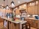 Gourmet kitchen boasts custom cabinetry, stainless steel appliances, and a center island at 107 Bella Casa Way, Clayton, NC 27527