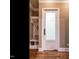 This mudroom has built-in storage with a door leading to the laundry room at 107 Bella Casa Way, Clayton, NC 27527