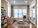 Bright playroom filled with natural light, hardwood floors, and space for activities at 107 Bella Casa Way, Clayton, NC 27527
