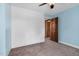 Bedroom with carpet floors, and an open door at 108 Birdie Ct, Rocky Mount, NC 27804