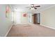 Large primary bedroom with a door to the bathroom at 108 Birdie Ct, Rocky Mount, NC 27804