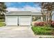 Two car garage with driveway and landscaping at 108 Birdie Ct, Rocky Mount, NC 27804