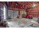 Spacious garage with two car doors and ample room for storage and a lawnmower at 108 Birdie Ct, Rocky Mount, NC 27804